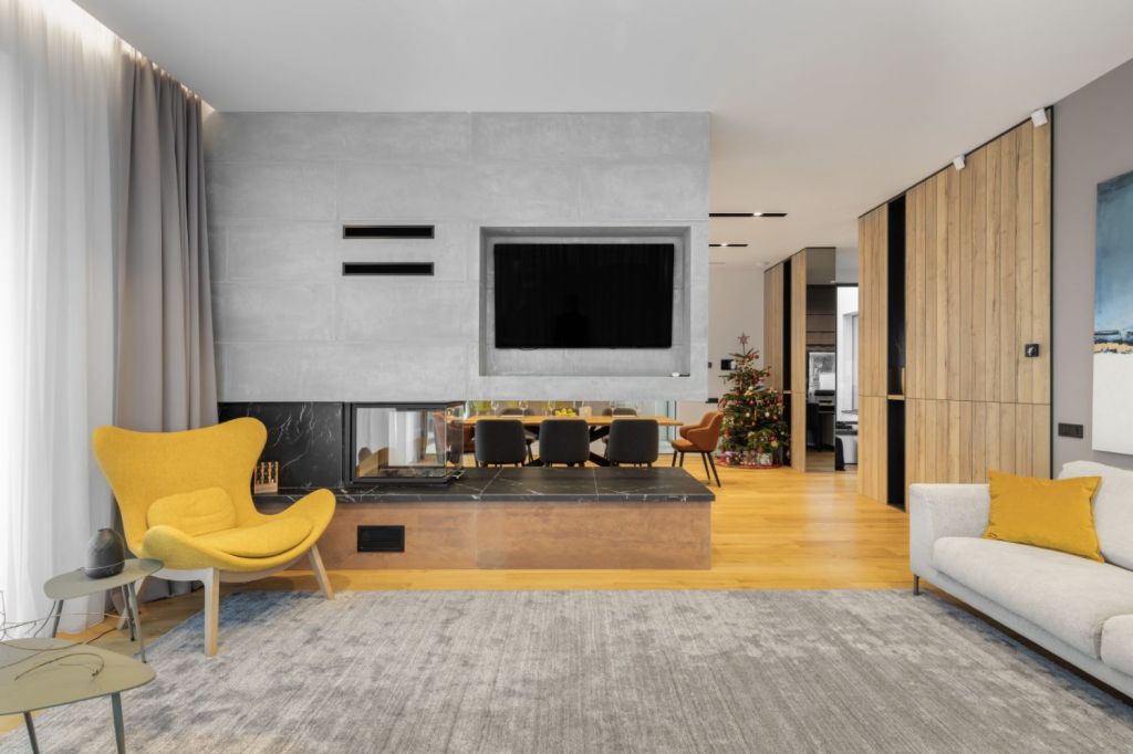Living open space contemporan - amenajare casa Sibiu - arh. Sergiu Califar Pure-Mess Design - șemineu în living