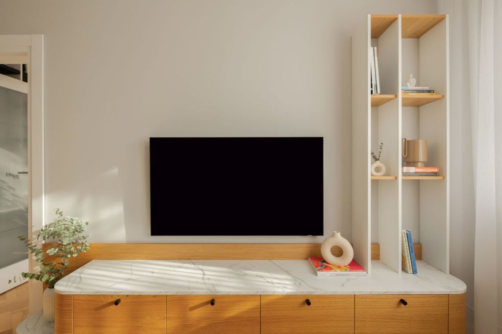 amenajare living stil scandinav cu influente mid century modern si japandi, cu parchet din lemn masiv in format herringbone si coltar alb pereti gri deschis si comoda din lemn in nuanta calda